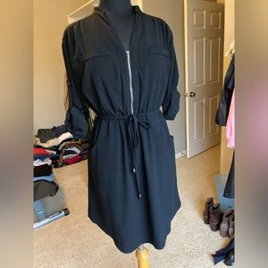 SMX Black Zippered Dress with draw strung waist and adjustable sleeves. Size 8